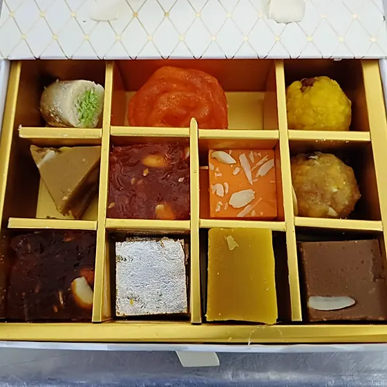 Gold Grid Gift Box — white diamond-pattern box with a 12-cell gold insert of assorted sweets