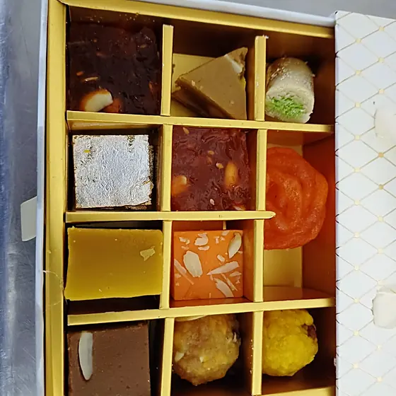 Gold Grid Gift Box — 12-cell gold insert box, open