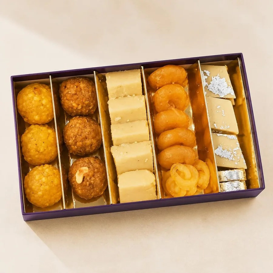 Five-Row Mithai Box on an ivory plate — Annapoorna Sweets