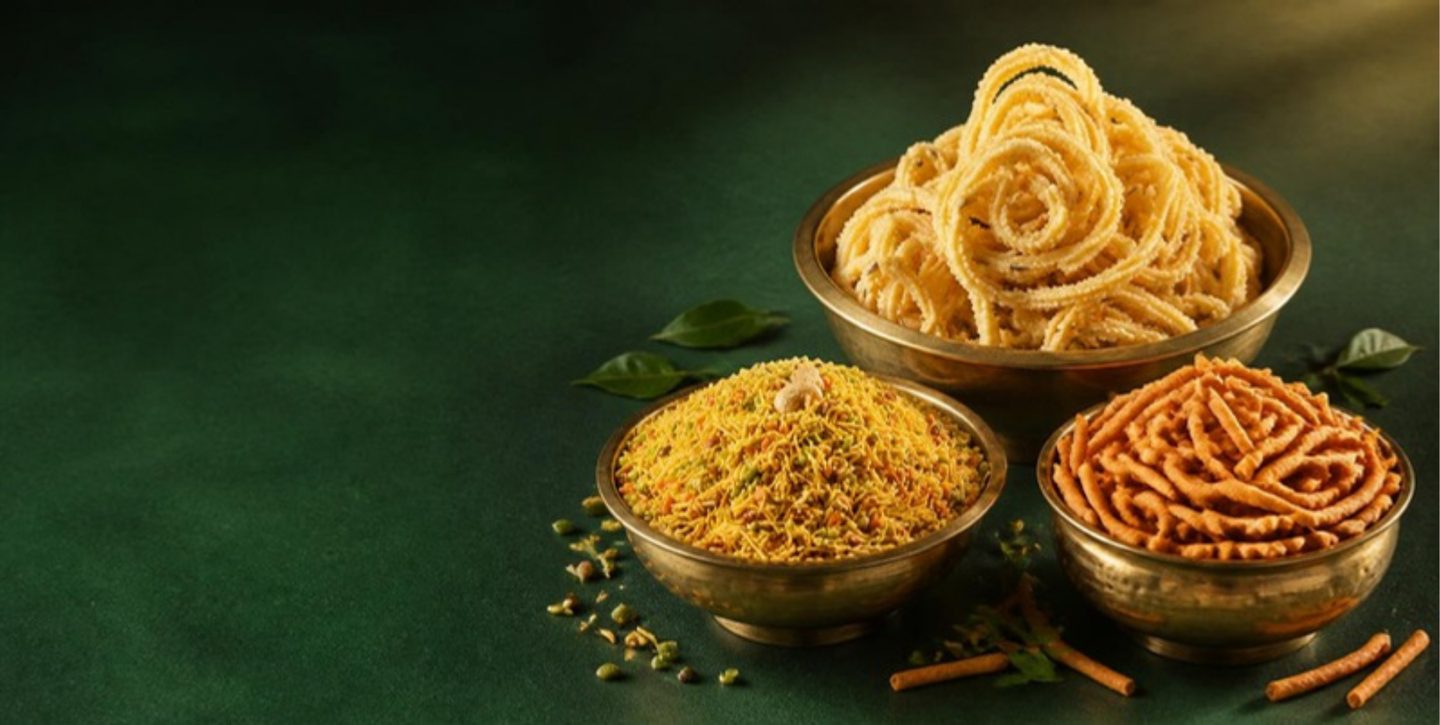 Murukku, Bombay mixture and kara sev in brass bowls